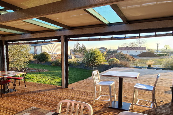 Photo d'une Bâche CLOSEO Verrière enroulée sur une Pergola Aluminium